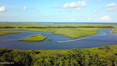 Tucked at the quiet end of Middle Island, this extraordinary - photo 1
