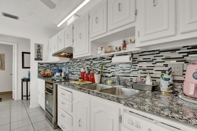 Welcome to your serene retreat at 701 Laconia Circle, B in the - photo 1