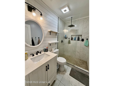 Welcome to Eastlawn! This updated 3-bedroom, 2-bath home sits on - photo 14