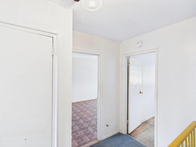 Semi-detached two-family home located in the Allerton section of - photo 12