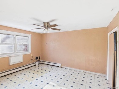 Semi-detached two-family home located in the Allerton section of - photo 13