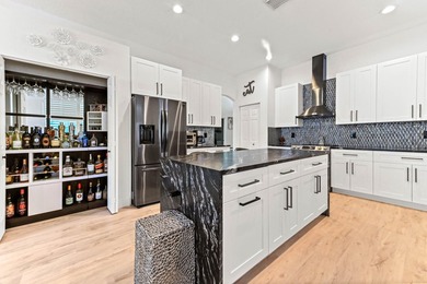 Welcome to this beautiful 1-story home in the gated community of - photo 3