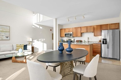 This stylish two story loft offers modern living with all the - photo 12