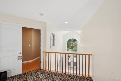 Welcome to this exceptional Hewlett residence, where timeless - photo 13