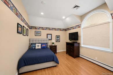 Welcome to this exceptional Hewlett residence, where timeless - photo 16