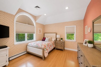 Welcome to this exceptional Hewlett residence, where timeless - photo 18