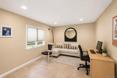 Welcome to this exceptional Hewlett residence, where timeless - photo 21