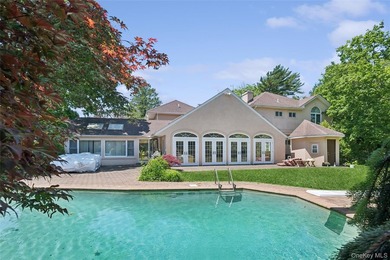 Welcome to this exceptional Hewlett residence, where timeless - photo 23