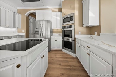 Completely updated from top to bottom, this luxury lakefront - photo 11