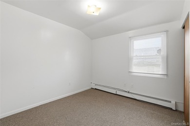 Welcome to this charming semi-attached two-family home offering - photo 20