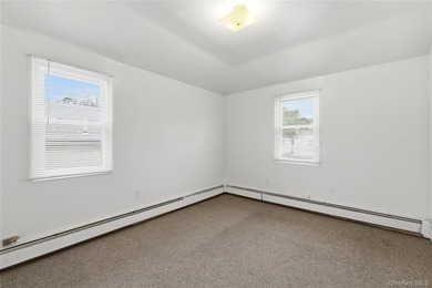 Welcome to this charming semi-attached two-family home offering - photo 22