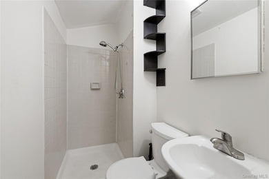 Welcome to this charming semi-attached two-family home offering - photo 24