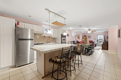 Welcome to this charming semi-attached two-family home offering - photo 27