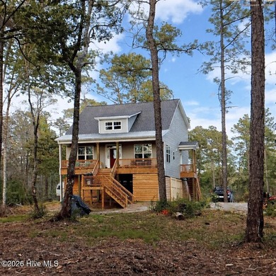 Nestled on approximately 13 scenic acres, this inviting - photo 1