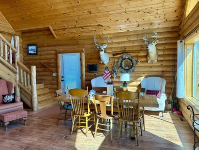 Well maintained log cabin located on Clear Lake - Lake City, SD - photo 4