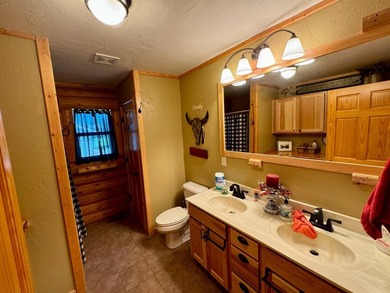 Well maintained log cabin located on Clear Lake - Lake City, SD - photo 7