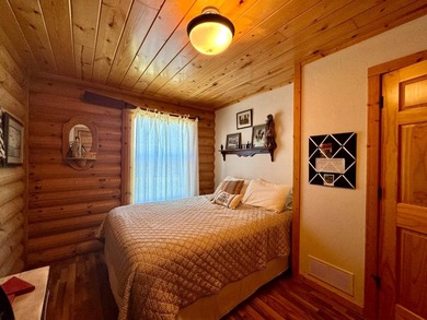 Well maintained log cabin located on Clear Lake - Lake City, SD - photo 9