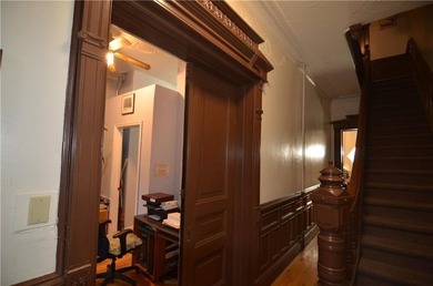 Welcome to this charming three-family brownstone, ideally - photo 12