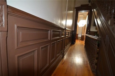 Welcome to this charming three-family brownstone, ideally - photo 13
