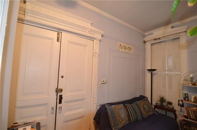 Welcome to this charming three-family brownstone, ideally - photo 16