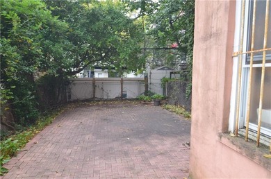 Welcome to this charming three-family brownstone, ideally - photo 20