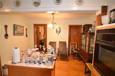 Welcome to this charming three-family brownstone, ideally - photo 23