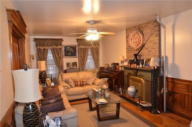 Welcome to this charming three-family brownstone, ideally - photo 26