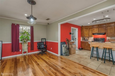 This spacious four-bedroom, two-bath home offers room to spread - photo 3