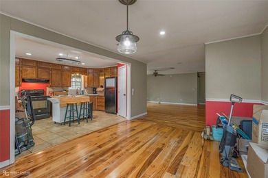This spacious four-bedroom, two-bath home offers room to spread - photo 4