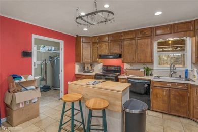 This spacious four-bedroom, two-bath home offers room to spread - photo 7