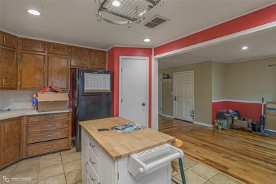 This spacious four-bedroom, two-bath home offers room to spread - photo 8