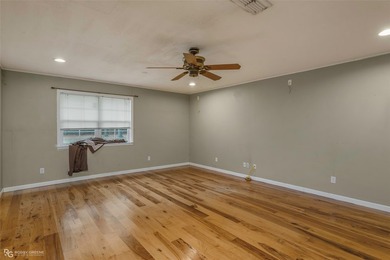 This spacious four-bedroom, two-bath home offers room to spread - photo 10