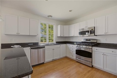 WELCOME HOME TO 189 FERRY LANDING CIRCLE. THIS RARE, CORNER UNIT - photo 12