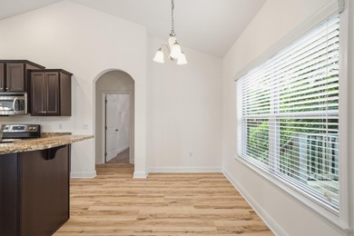 Set on a huge 0.52 acre lot with peaceful forest views, this - photo 19