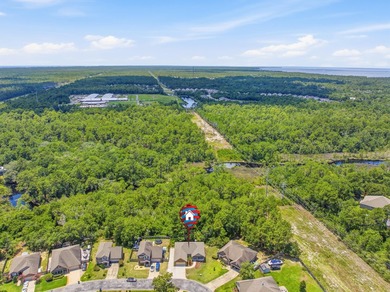 Set on a huge 0.52 acre lot with peaceful forest views, this - photo 45