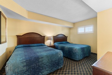 This beautifully furnished three bedroom Penthouse level unit at - photo 18
