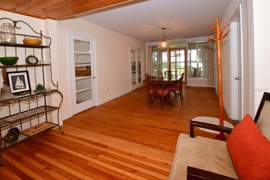 Welcome to Old Florida! Stepping onto the screened porch is like - photo 19