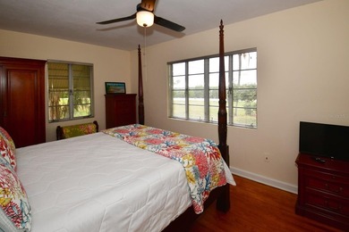 Welcome to Old Florida! Stepping onto the screened porch is like - photo 26