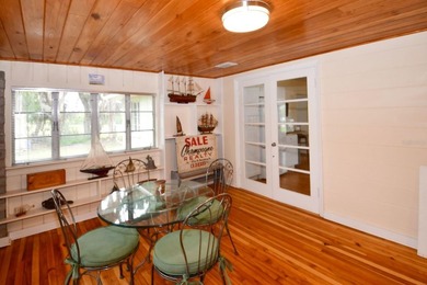 Welcome to Old Florida! Stepping onto the screened porch is like - photo 49