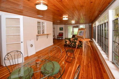 Welcome to Old Florida! Stepping onto the screened porch is like - photo 50