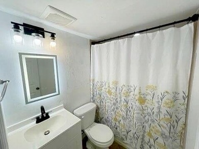 This updated first-floor condo is located in a well-established - photo 12