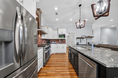 Experience luxury living on peaceful Lake Catherine in this 3 - photo 16