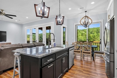 Experience luxury living on peaceful Lake Catherine in this 3 - photo 18