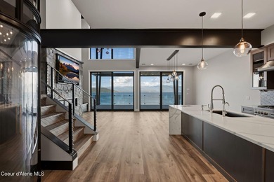 Welcome to the exquisite TOP floor 2-story penthouse at Building - photo 5