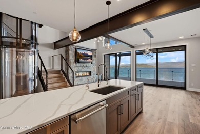 Welcome to the exquisite TOP floor 2-story penthouse at Building - photo 7