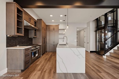Welcome to the exquisite TOP floor 2-story penthouse at Building - photo 9