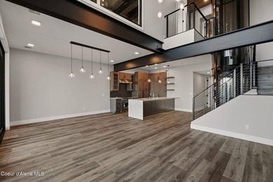 Welcome to the exquisite TOP floor 2-story penthouse at Building - photo 10