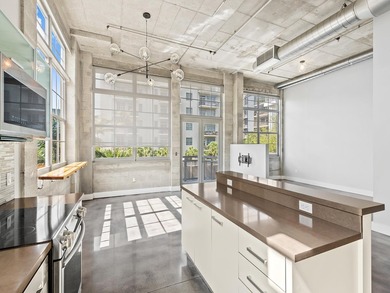 Step into this light filled, loft style studio in the heart of - photo 11