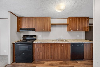 Affordable space with smart design! This 3-bedroom, 2-bathroom - photo 3