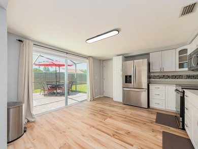 Newly renovated 3 bedroom 3 bathroom home sitting on a oversized - photo 15